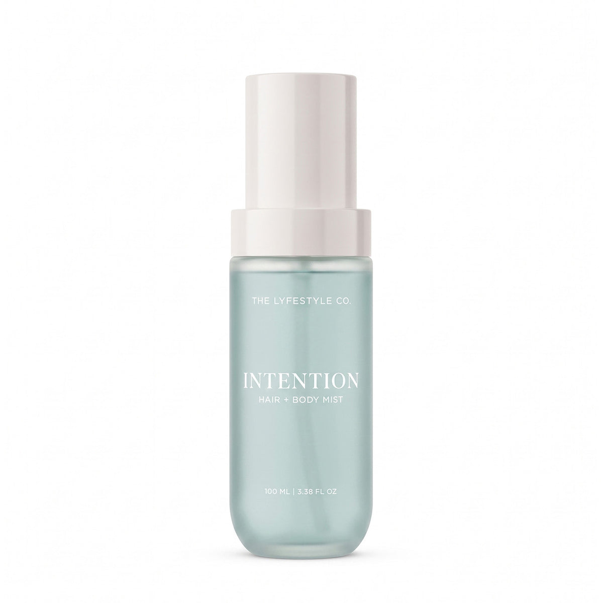 A bottle of The Lyfestyle Co. Intention Hair & Body Mist, featuring a frosted plastic bottle filled with a light blue liquid and a white spray dispenser, set against a plain white background.